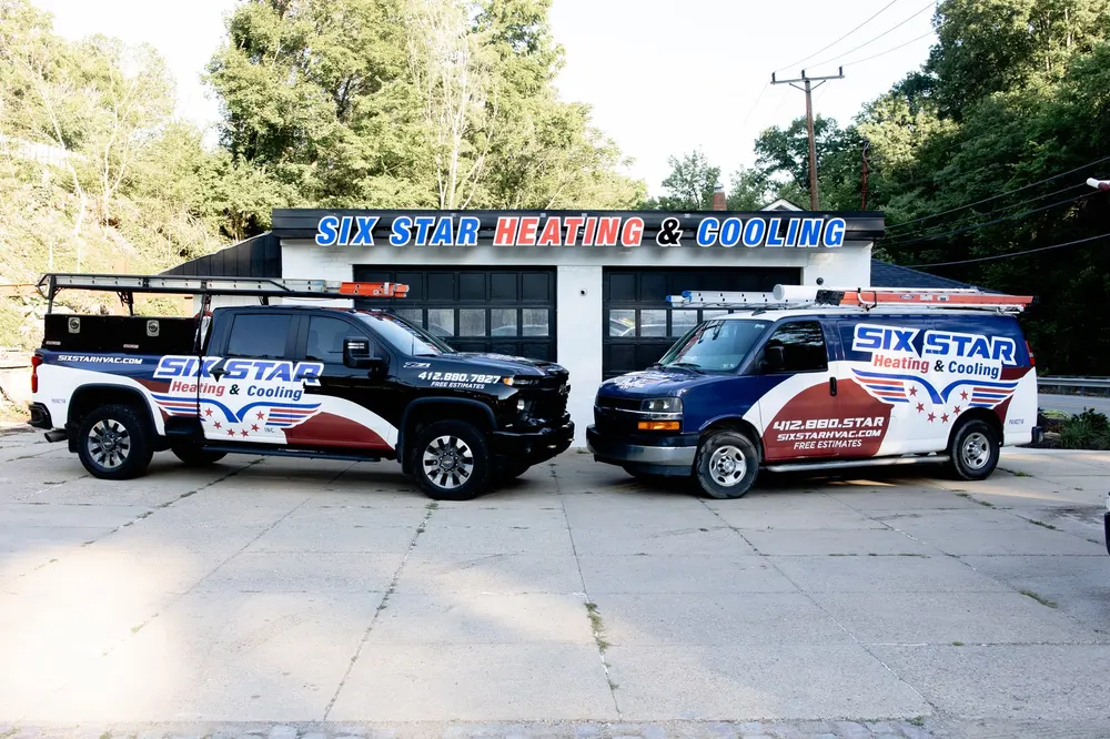 Six Star Heating & Cooling branded service van and truck — the family-owned Carnegie fleet serving Greater Pittsburgh.